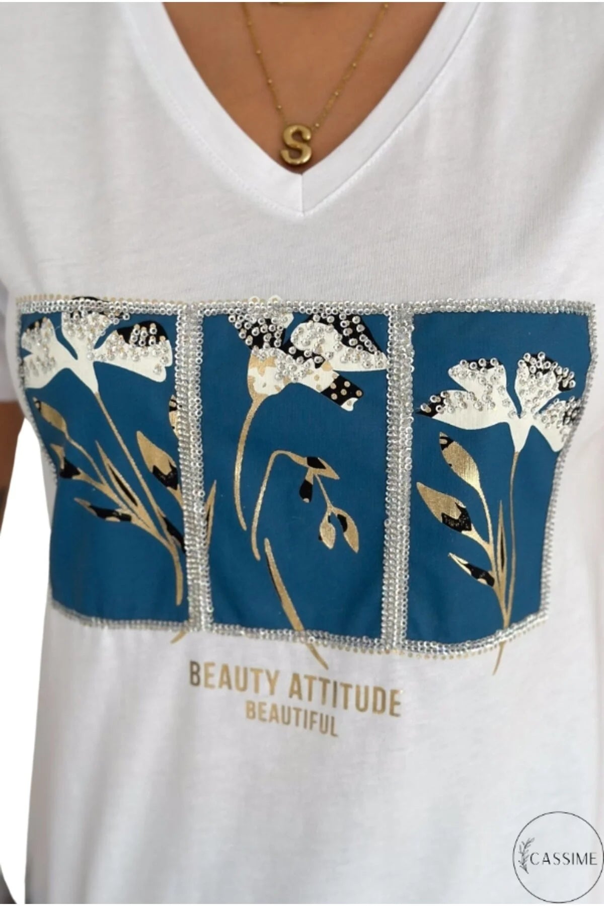 Camiseta de algodón Tilda blanca con lentejuelas florales azules