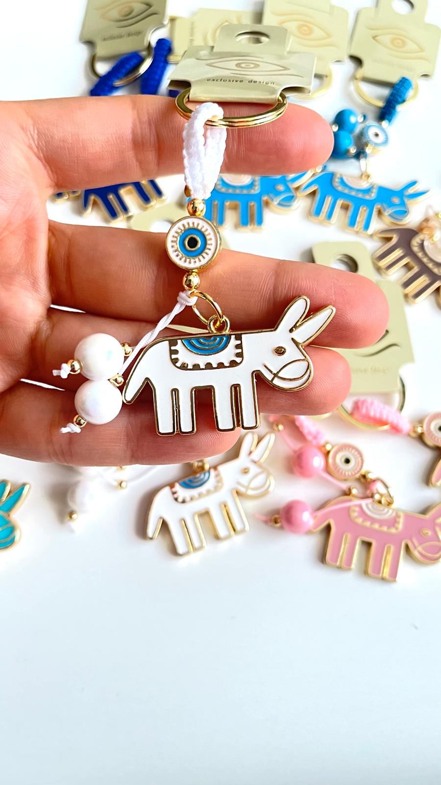 White Donkey Design Gold Evil Eye Keychain