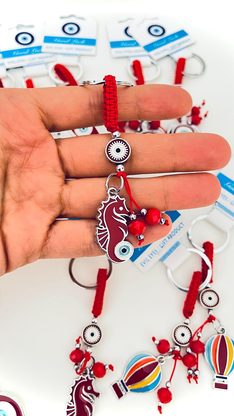 Llavero de Caballito de Mar Plata Rojo Ojo Turco