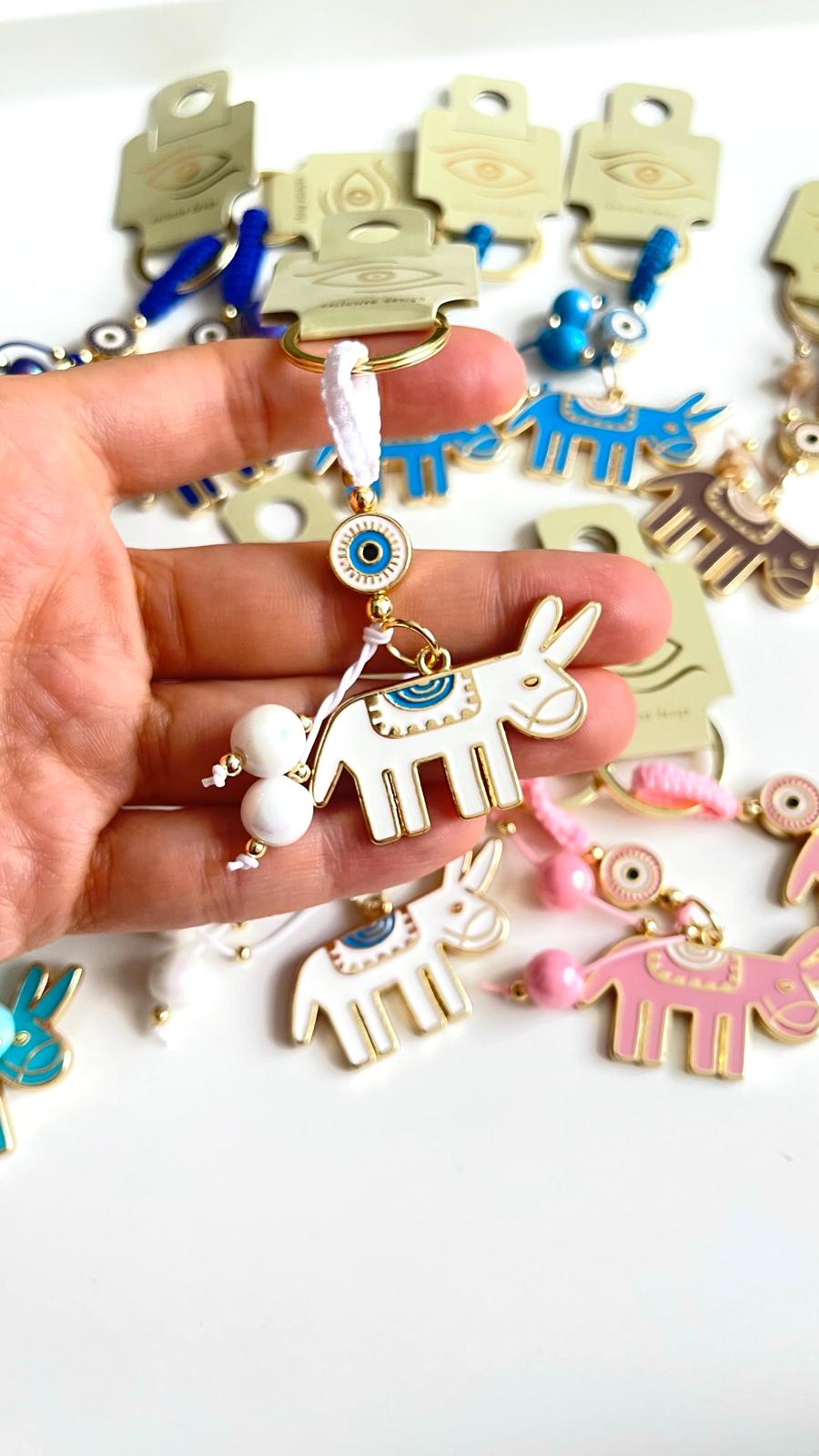 White Donkey Design Gold Evil Eye Keychain