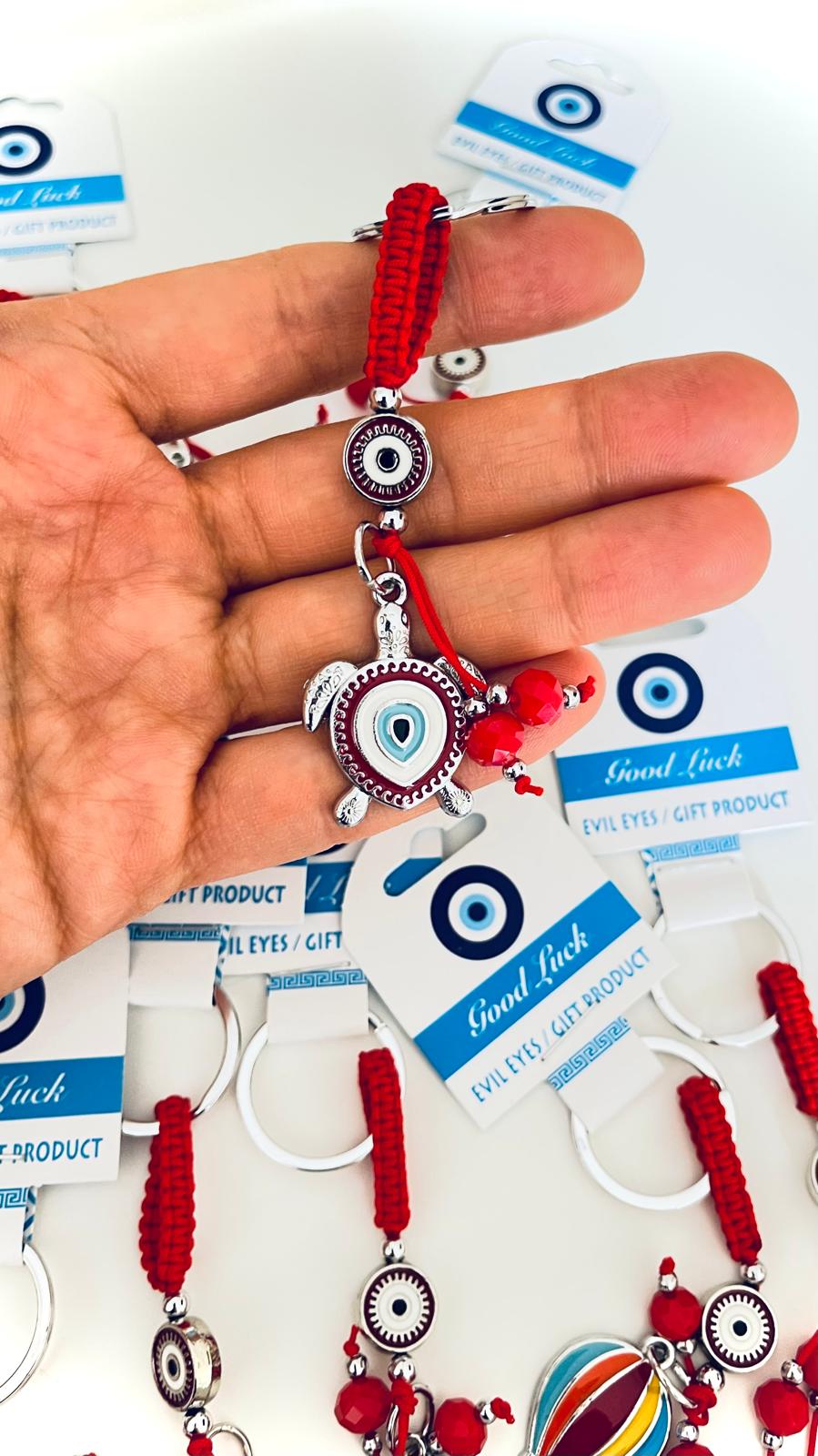 Llavero de plata con ojo de tortuga y diseño de ojo turco