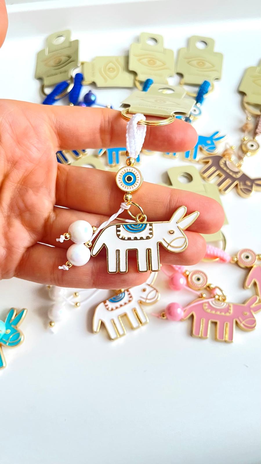 White Donkey Design Gold Evil Eye Keychain