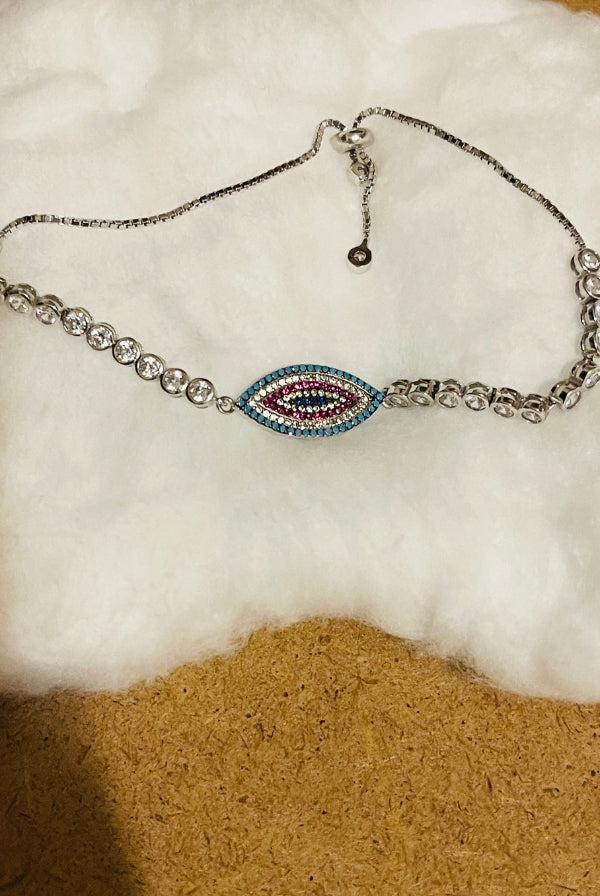 Ασημένιο βραχιόλι με μάτι και πέτρες ζιργκόν