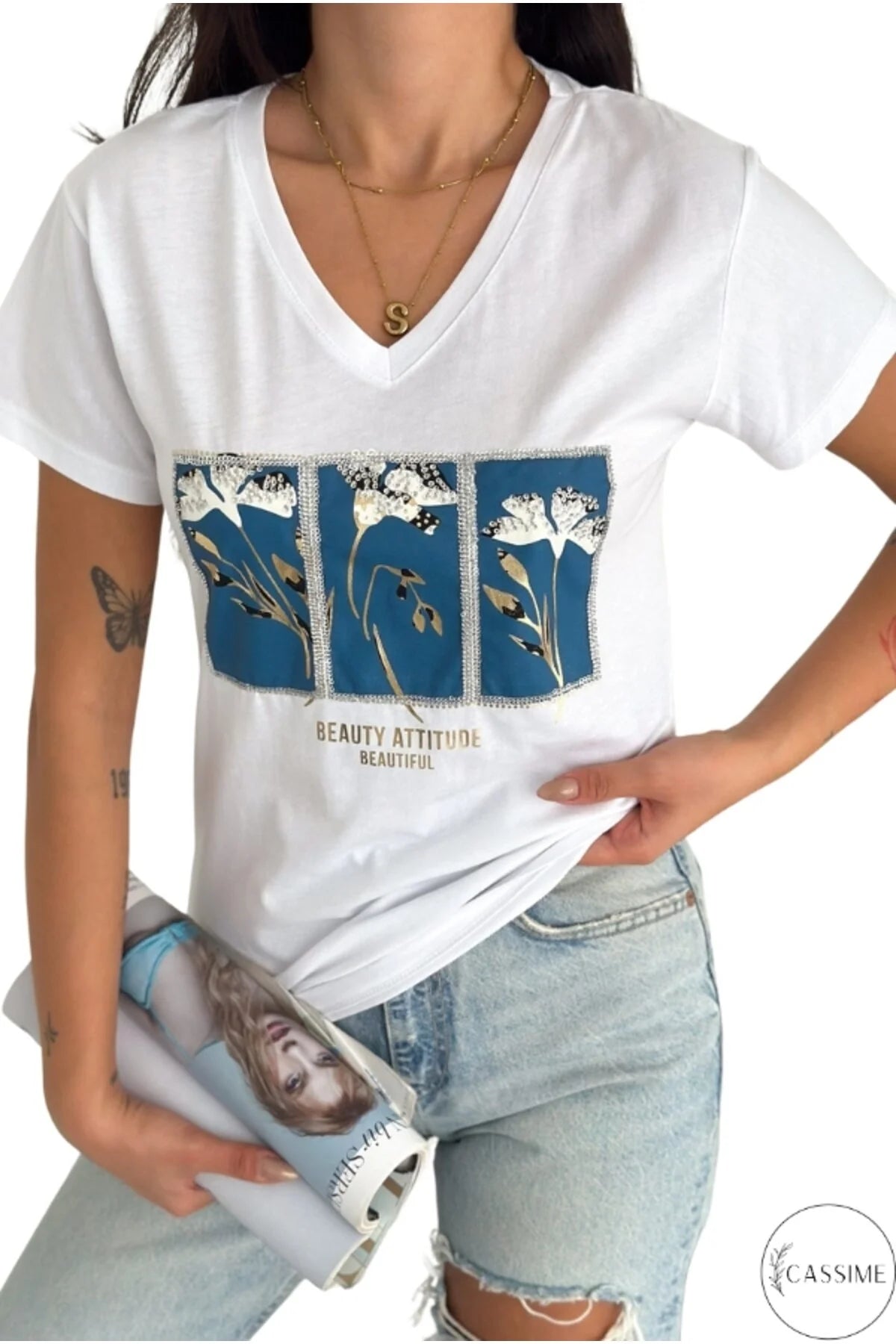 Camiseta de algodón Tilda blanca con lentejuelas florales azules