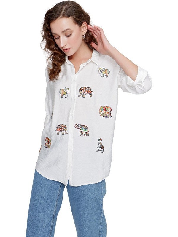 Blusa de lino bordada con elefante color crema