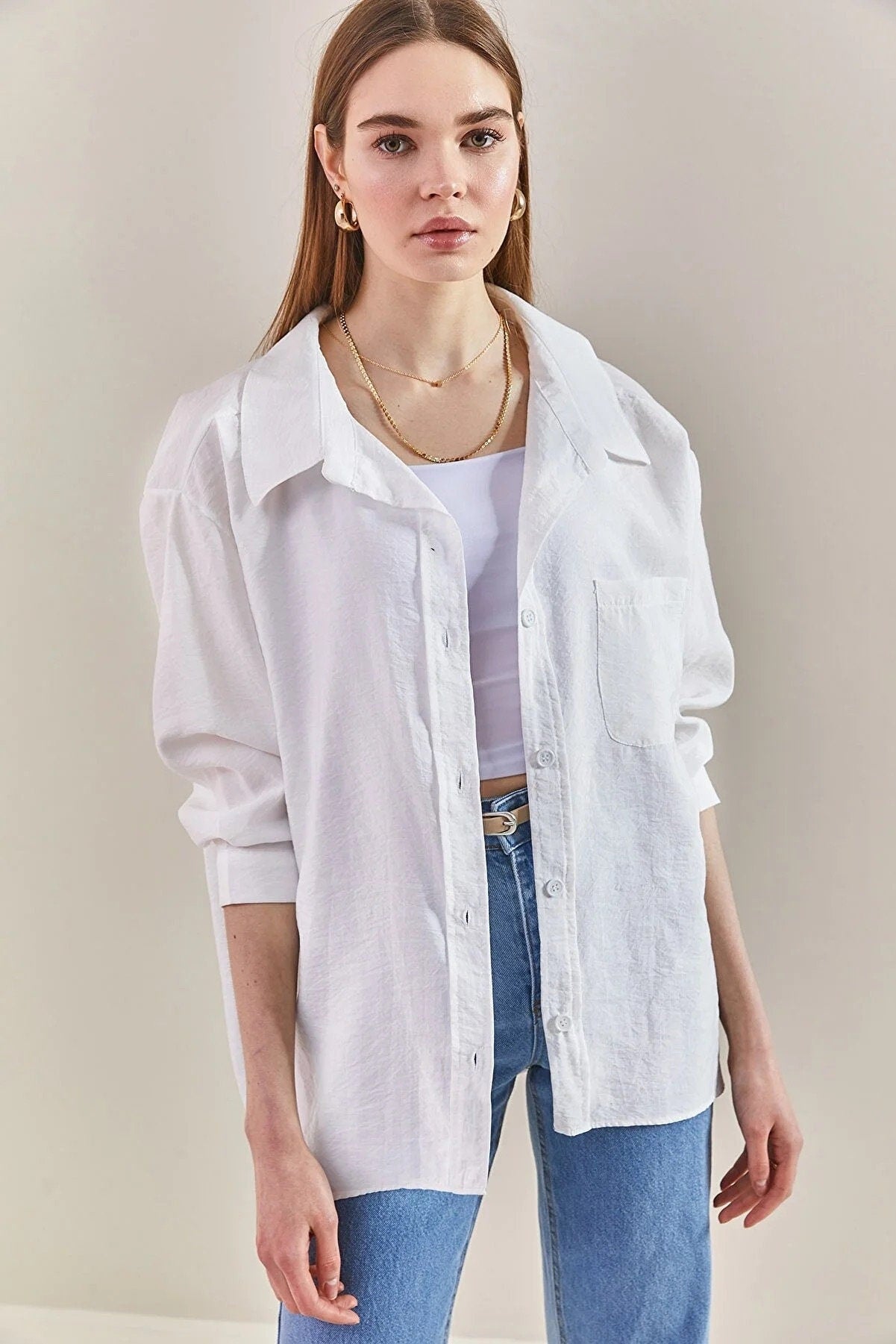 Blusa clásica de lino negro de manga larga