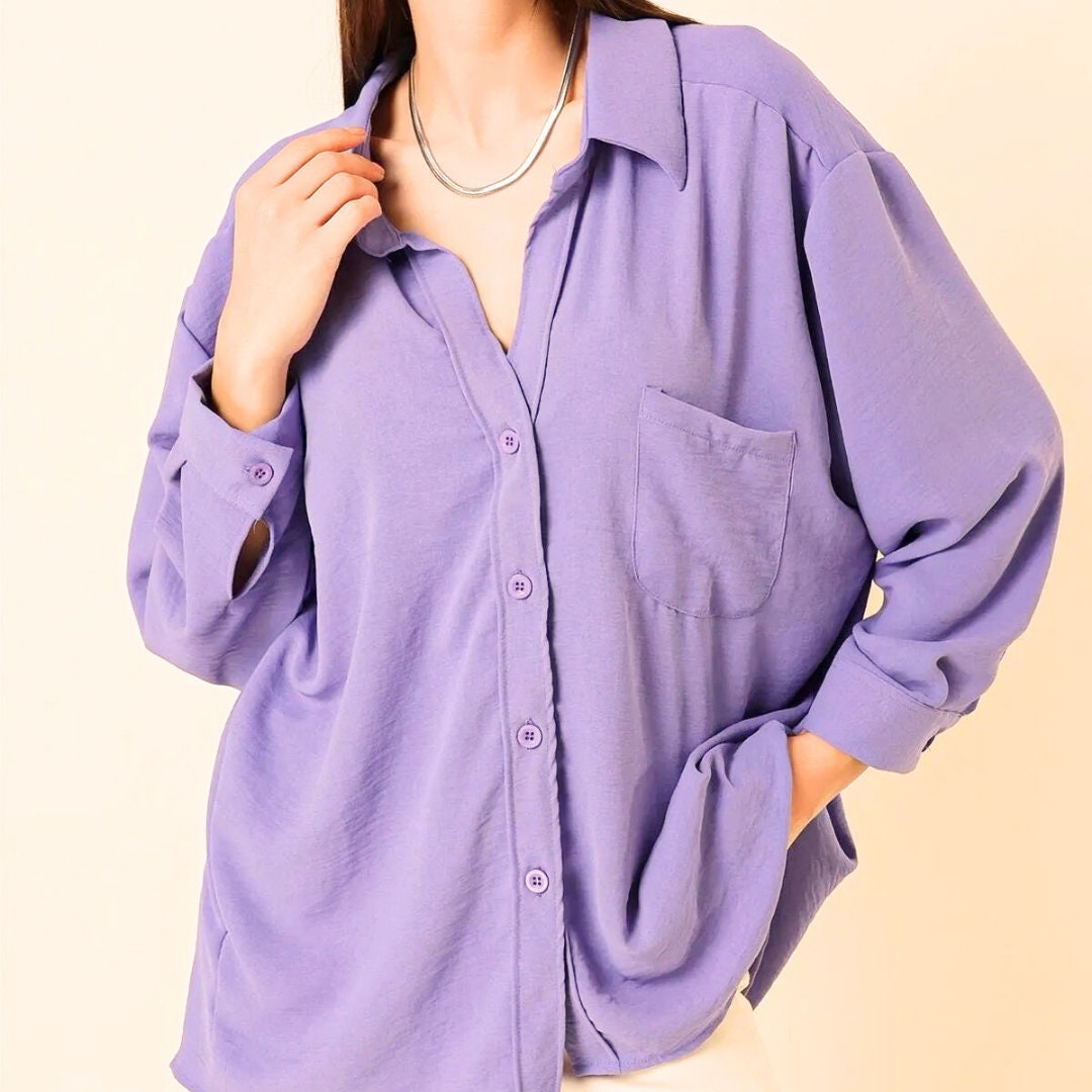 Blusa clásica de lino negro de manga larga