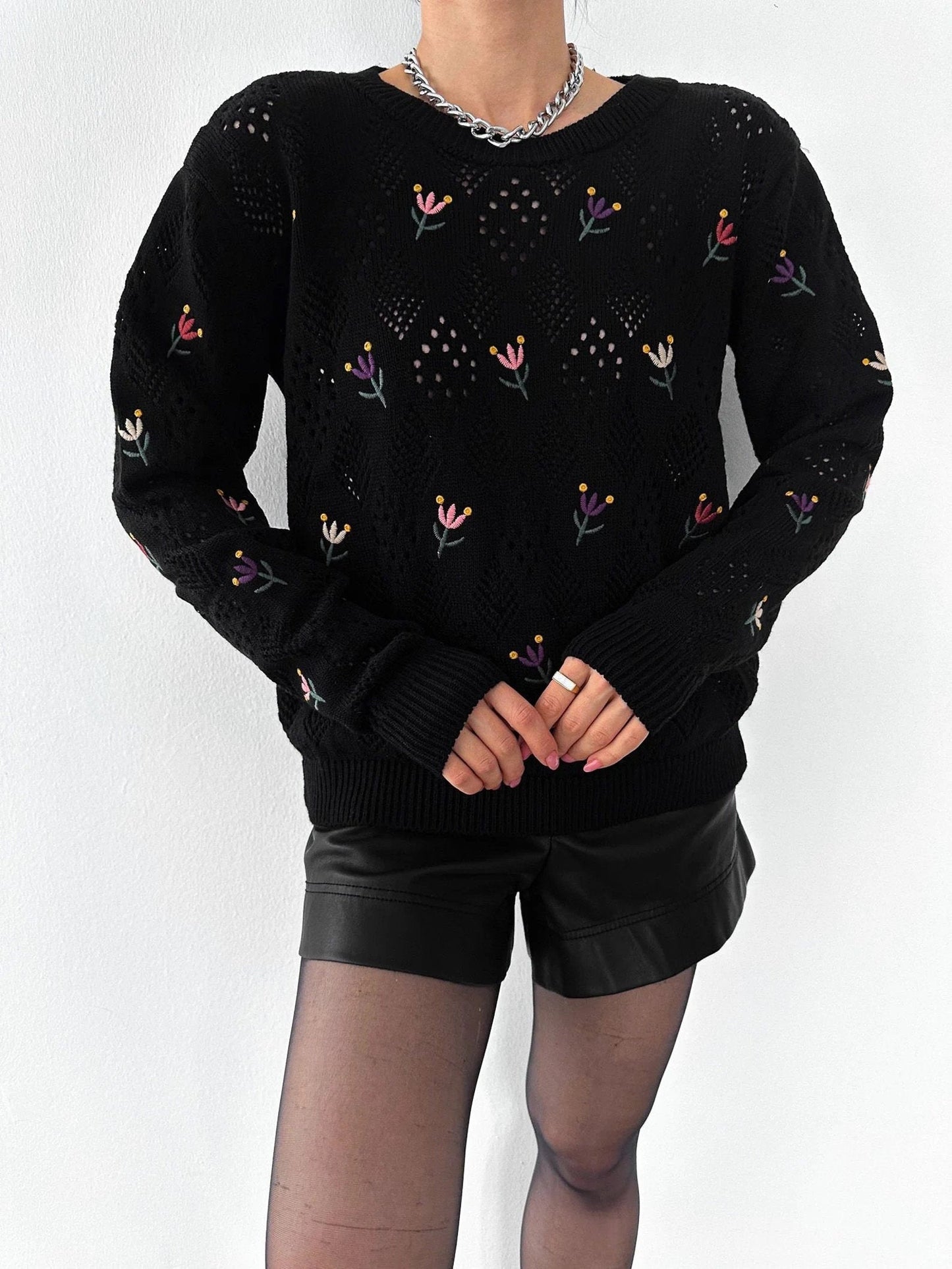 Jersey de punto bordado floral negro