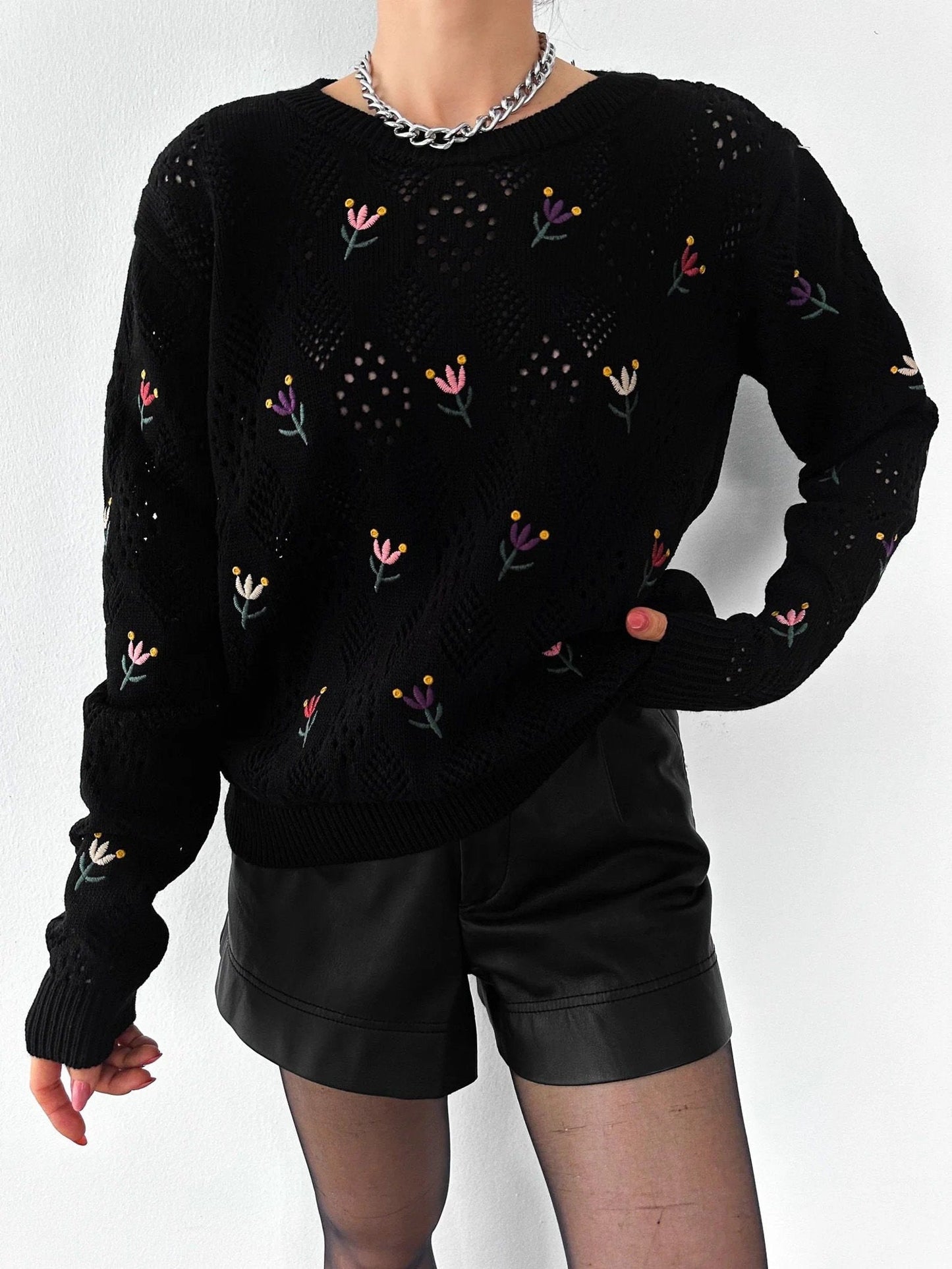 Jersey de punto bordado floral negro